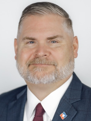 Headshot of Chris Furlow, TBA CEO & President