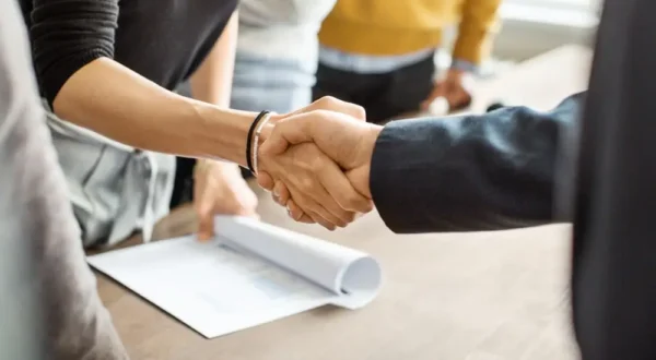 Two people shaking hands